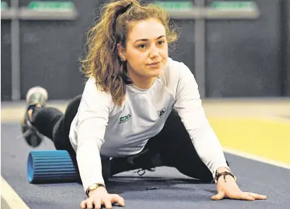  ?? SAM BARNES/SPORTSFILE ?? Sophie Becker warms up at the Emirates Arena in Glasgow. She will be one of seven Irish athletes making their senior individual debut at a major championsh­ip European Indoors begin today
