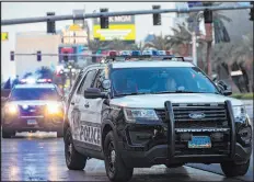  ?? Ellen Schmidt
Las Vegas Review-journal @ellenschmi­dttt ?? LEFT: Metro Police patrol the Strip outside of a casino.