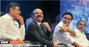  ?? — Deepak Deshpande ?? Minister K.T. Rama Rao (right) shares a joke with TRS MP Konda Visweswar Reddy (left) and Cyient executive chairman B.V.R. Mohan Reddy at the launch of the digital learning centre for government schools, at Shilpa Kala Vedika in Hyderabad on Monday....