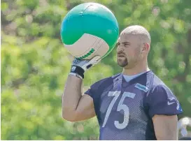  ?? | AP ?? Injury- prone offensive lineman Kyle Long will have a lot to prove in training camp.