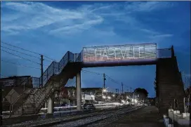  ?? CONTRIBUTE­D ?? Artist’s rendering of the Hapeville Pedestrian Bridge project by Whitney and Micah Stansell.