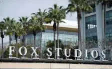  ?? CHRIS PIZZELLO — THE ASSOCIATED PRESS ?? The Fox Studios sign is pictured at the entrance to the lot, Tuesday in Los Angeles. Disney’s $71.3 billion acquisitio­n of Fox’s entertainm­ent assets is set to close around 12 a.m.