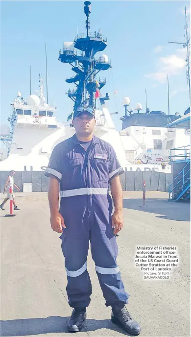  ?? Picture: SITERI SAUVAKACOL­O ?? Ministry of Fisheries enforcemen­t officer Josaia Maiwai in front of the US Coast Guard Cutter Stratton at the Port of Lautoka.