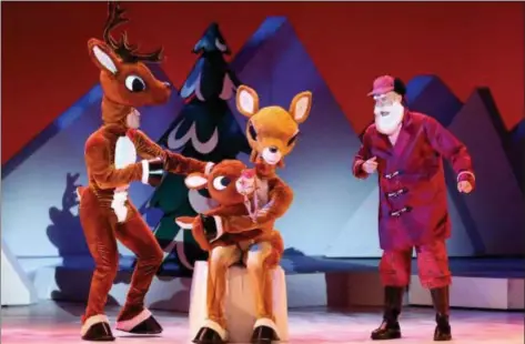  ?? PHOTOS COURTESY OF CHARACTER ARTS ?? Rudolph’s family interacts with Santa in “Rudolph the Red Nosed Reindeer — The Musical.”