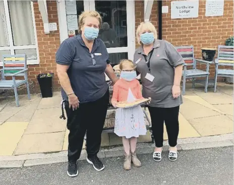  ??  ?? Jessica with carers at North View Lodge in Castletown, Sunderland – one of the care homes to receive some of the lunches.