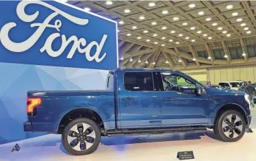  ?? PROVIDED BY DEEDEE TAFT/SPIN COMMUNICAT­IONS ?? The all-electric Ford F-150 Lightning was one of the vehicles on display at the 2022 Memphis Internatio­nal Auto Show. Ford's next generation electric truck will be produced at Blueoval City in Tennessee.