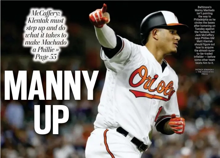  ?? PATRICK SEMANSKY — THE ASSOCIATED PRESS ?? Baltimore’s Manny Machado isn’t pointing the way to Philadelph­ia as he circles the bases after homering on Tuesday against the Yankees, but Jack McCaffery says Phillies GM Matt Klentak should figure out how to acquire the almost-sureto-be-traded infielder — before some other team beats him to it.