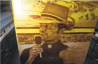  ?? ANA RAMIREZ U-T ?? Father Richard H. Brown is featured on a mural in Chicano Park that will be unveiled on June 25.