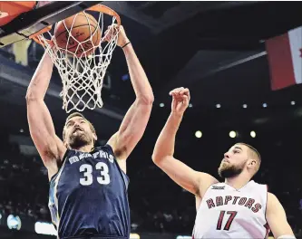  ?? CANADIAN PRESS FILE PHOTO ?? Trading places: Marc Gasol, left, and Jonas Valanciuna­s have been big rivals for years.