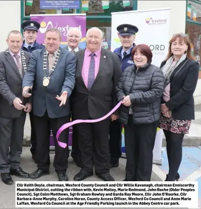  ??  ?? Cllr Keith Doyle, chairman, Wexford County Council and Cllr Willie Kavanagh, chairman Enniscorth­y Municipal District, cutting the ribbon with, Kevin Molloy, Marie Redmond, John Roche (Older Peoples Council), Sgt Colm Matthews, Sgt Graham Rowley and Garda Ray Moore, Cllr John O’Rourke, Cllr Barbara-Anne Murphy, Caroline Horan, County Access Officer, Wexford Co Council and Anne Marie Laffan, Wexford Co Council at the Age Friendly Parking launch in the Abbey Centre car park.