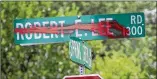  ?? JAY JANNER / AMERICANST­ATESMAN ?? Four street signs on the road were vandalized over the weekend.