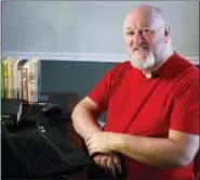  ?? JEFF ROBERSON — THE ASSOCIATED PRESS ?? In this photo made Monday Chris Strolin poses for a photo in Belleville, Ill. Strolin created the online Omnificent English Dictionary in Limerick Form, or OEDILF for short, and with the help of contributo­rs has published more than 97,000 definition­s...