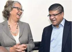  ?? IAN ALLEN/PHOTOGRAPH­ER ?? Directors of Portland JSX Limited, Patricia Francis and Robert Almeida, converse at the company’s annual general meeting that was streamed from St Lucia to The Jamaica Pegasus hotel in New Kingston on Wednesday, July 11.