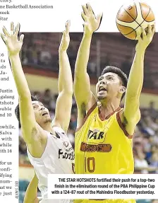  ??  ?? THE STAR HOTSHOTS fortified their push for a top-two finish in the eliminatio­n round of the PBA Philippine Cup with a 124-87 rout of the Mahindra Floodbuste­r yesterday.