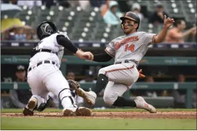  ?? JOSE JUAREZ - THE ASSOCIATED PRESS ?? Detroit Tigers catcher Grayson Greiner, left, tags out Baltimore Orioles’ Rio Ruiz at home plate in the sixth inning of a baseball game Sunday, Sept. 15, 2019, in Detroit.