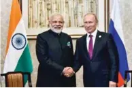  ?? - PTI/PIB ?? ELATED: Prime Minister Narendra Modi and Russian President Vladimir Putin at the sidelines of the 9th BRICS Summit in Xiamen, China on Monday.