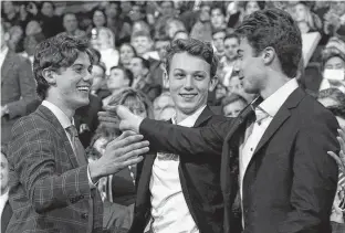  ?? DAVE SANDFORD • POSTMEDIA NEWS ?? Luke Hughes (centre) will join his brothers Jack (left) and Quinn as first round NHL draft picks on Friday. Just where the defenceman goes in the first round is anyone’s guess at this point.