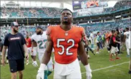  ?? LYNNE SLADKY — THE ASSOCIATED PRESS ?? Bears outside linebacker Khalil Mack (52) walks off the field after Sunday’s game against the Dolphins.