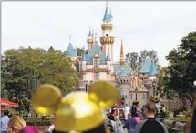  ?? JAE C. HONG AP FILE ?? After a four-month pause, sales of all four tiers of Disneyland’s Magic Key annual passes will restart today.