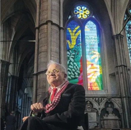 ?? VICTORIA JONES ?? British artist David Hockney designed The Queen’s Window that was unveiled at Westminste­r Abbey Wednesday. The 81-year-old was approached to design the tribute because he is “the most celebrated artist alive,” said Dean of Westminste­r John Hall.