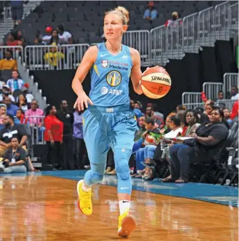  ?? SCOTT CUNNINGHAM/GETTY IMAGES ?? Courtney Vandersloo­t, who had 14 points and 10 assists Tuesday against the Dream, is on pace to finish first in assist average in the WNBA for the third consecutiv­e season.