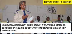  ?? PHOTOS: ESTELLE SINKINS ?? uMngeni Municipali­ty traffic officer, Noluthando Mhlongo, speaks to the pupils about what is required to work in law enforcemen­t.