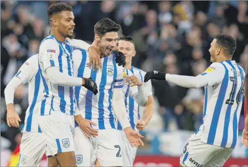  ?? PICTURE: BRUCE ROLLINSON. ?? MATTER OF TRUST: Huddersfie­ld Town captain Christophe­r Schindler says he is is prepared to trust the authoritie­s and their medical advisers.