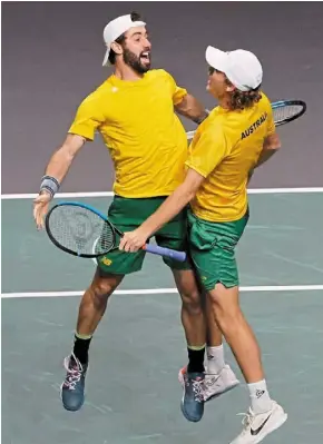  ?? — Reuters ?? Yes, we did it: australia’s Jordan Thompson (left) and max Purcell celebrate after winning their semi- final match against Croatia’s nikola mektic and mate Pavic in malaga, Spain.