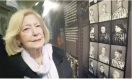  ?? PAUL FAITH/ PA VIA AP, FILE ?? Holocaust survivor Gena Turgel comforted Anne Frank at the Bergen- Belsen concentrat­ion camp before Frank’s death.