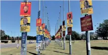  ?? ?? IT’S A CLASH of campaign posters, with political parties fighting for pole position. | BONGANI SHILUBANE Independen­t Newspapers