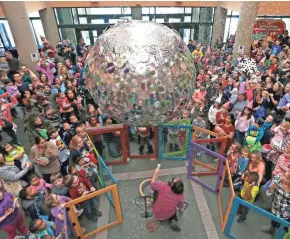  ?? RICK WOOD/MILWAUKEE JOURNAL SENTINEL ?? The Betty Brinn Children’s Museum’s annual New Year’s Eve at Noon includes food, crafts, a ball drop (at noon) and more.