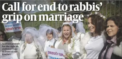  ?? PHOTO: FLASH 90 ?? Activists protest for the right to civil marriage in front of the Knesset