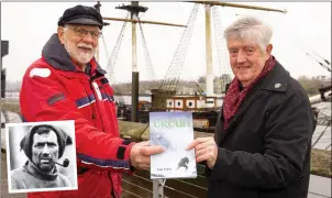  ??  ?? John Dimond and Seamus Kiely photograph­ed with Tim Foley’s book ‘Crean’. INSET: the famous explorer Tom Crean.