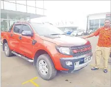  ?? Picture: SUPPLIED ?? Sales consultant Reveriano Kanavakati­ni with Ford Ranger 3.2L wildtrak.