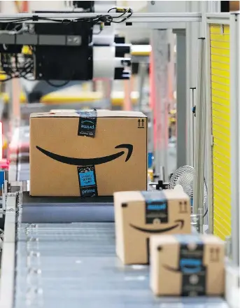  ?? PHOTOS: PATRICK SEMANSKY, FILES ?? Amazon’s fulfilment centres are providing jobs, but some, like Ricardo Tranjan with the Canadian Centre for Policy Alternativ­es, question the quality of those positions.