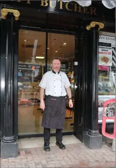  ??  ?? Mark Wickham, owner of Wickham’s Butchers, Market Square