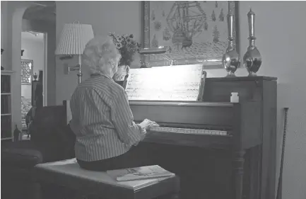  ?? ROBIN GALLAHER BRANCH ?? Margaret loves to play the piano.