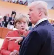  ?? FOTO: DPA ?? Merkel (l.) und Trump bei G20.