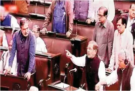  ??  ?? JD(U)’S Sharad Yadav, Congress Party’s Anand Sharma and other members in the Rajya Sabha on Tuesday