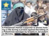  ?? AFP ?? A Palestinia­n Hamas supporter is shown holding a rifle during a protest against the killing of a Palestinia­n teenager by Israelis in Jerusalem on Monday.