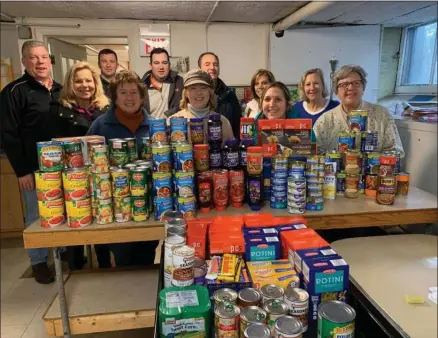  ?? FROM UNITED WAY OF GREATER ONEIDA FACEBOOK PAGE ?? The United Way of Greater Oneida Board dropped off food to the St. Patrick’s Food Kitchen as per their 15Can Challenge.