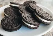  ?? MANDEL NGAN/GETTY IMAGES/FILES ?? You might be surprised to learn that Oreo cookies are vegan. But they’re at risk for cross-contaminat­ion with milk.