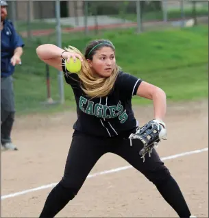  ?? MIKE BUSH/NEWS-SENTINEL ?? Elliot Chrisitan third baseman Tabitha Lang gets ready to throw to first base after an infield bunt in Tuesday's CCAA softball game against Stone Ridge Christian.