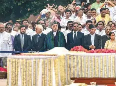  ?? PTI ?? Former Afghanista­n president Hamid Karzai and representa­tives of SAARC countries attend the cremation of Atal Bihari Vajpayee in New Delhi yesterday.