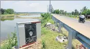  ??  ?? ■ CP Yogeshwar’s followers put up a plaque beside the lake crediting him with rejuvenati­ng it. ARIJIT SEN/HT