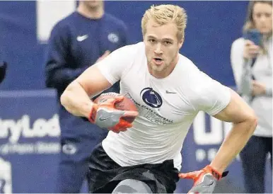  ?? GENE J. PUSKAR/AP ?? Tight end Mike Gesicki, out of Penn State, will need to become a respectabl­e blocker for his pick not to be second-guessed, according to Omar Kelly.