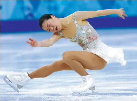  ?? REUTERS ?? Akiko Suzuki of Japan performs at the 2014 Winter Olympics in Sochi. The now-retired figure skater has revealed her struggles with anorexia.