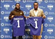  ?? Noah K. Murray / Associated Press ?? New York Giants draft picks Evan Neal and Kayvon Thibodeaux are introduced during a news conference in East Rutherford, N.J., on Saturday.