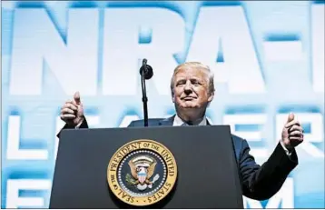  ?? TOM FOX/DALLAS MORNING NEWS ?? President Donald Trump addresses the NRA convention Friday in Dallas, where he steered clear of his latest controvers­y.