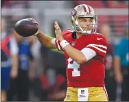  ?? JOSE CARLOS FAJARDO/TRIBUNE NEWS SERVICE ?? San Francisco 49ers starting quarterbac­k Nick Mullens (4) looks to throw against the Oakland Raiders on Nov. 1.